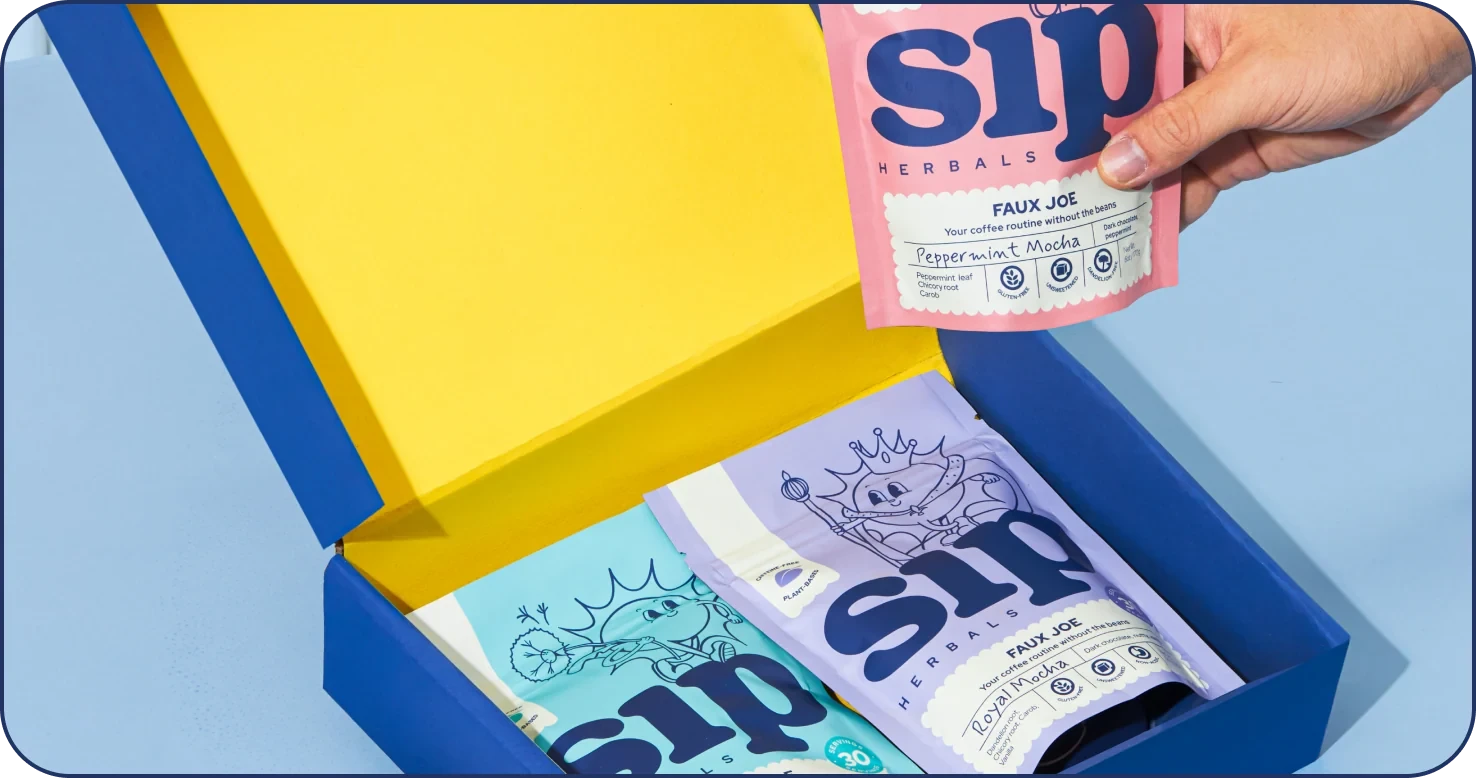 Blue box filled with Signature Roast, Royal Mocha and Salted Maple Blondie Coffee Alternative
